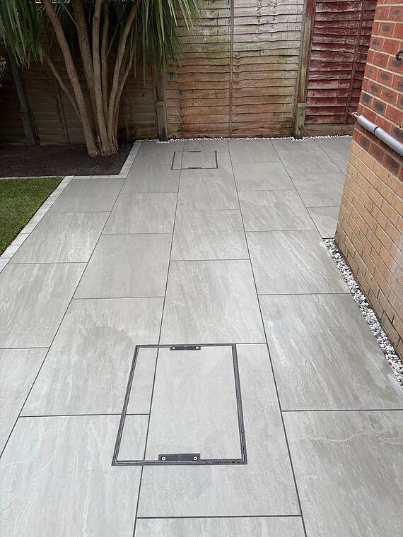 Full garden transformation, Fareham -- One of three recessed drainage trays, cut and fitted with matching porcelain inserts for a flush finish.